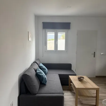 - M A N U E L A Apartment Bolonia